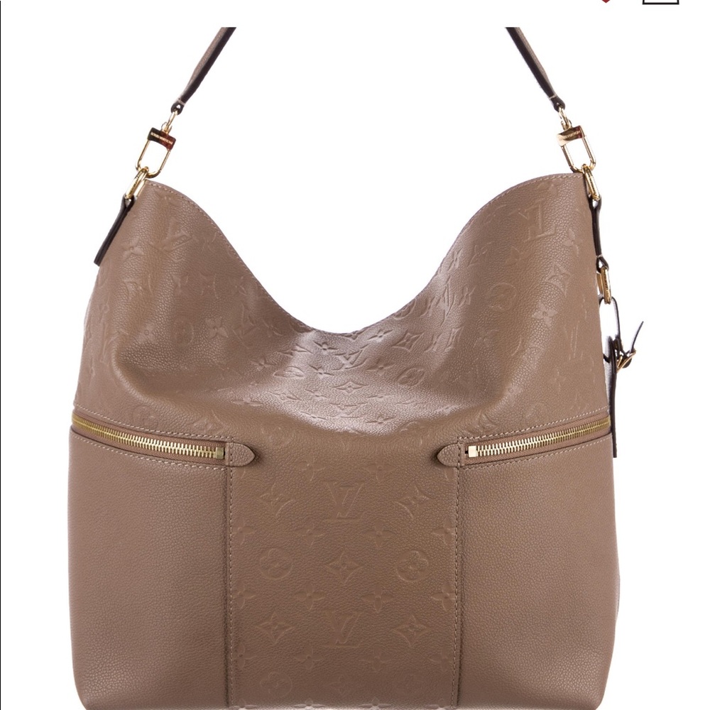 Not for sale.ISO Louis Vuitton Melie TAUPE GLAZE.
